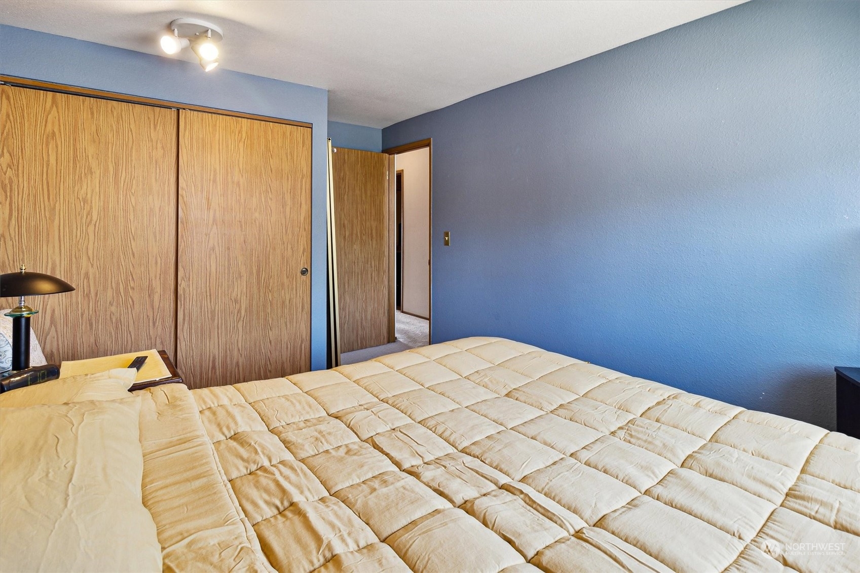 12115 Southeast 280th Street Kent, WA 98030 - Photo 34 of 40 a bedroom with a bed and a window