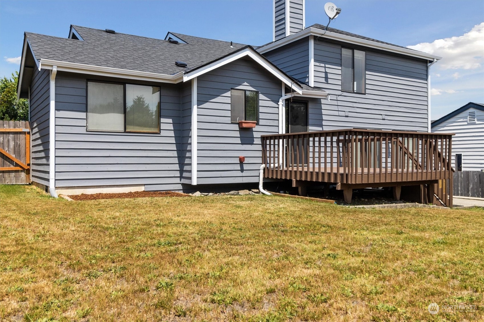 12115 Southeast 280th Street Kent, WA 98030 - Photo 35 of 40 a front view of a house with a yard