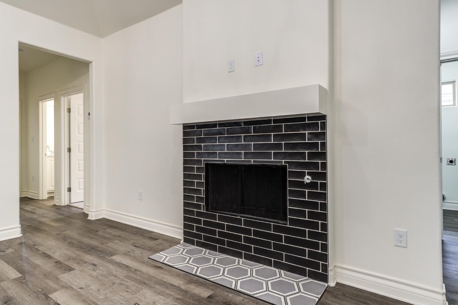 3712 144th Street Lubbock, TX 79423 - Photo 25 of 46 a stove top oven sitting inside of a kitchen