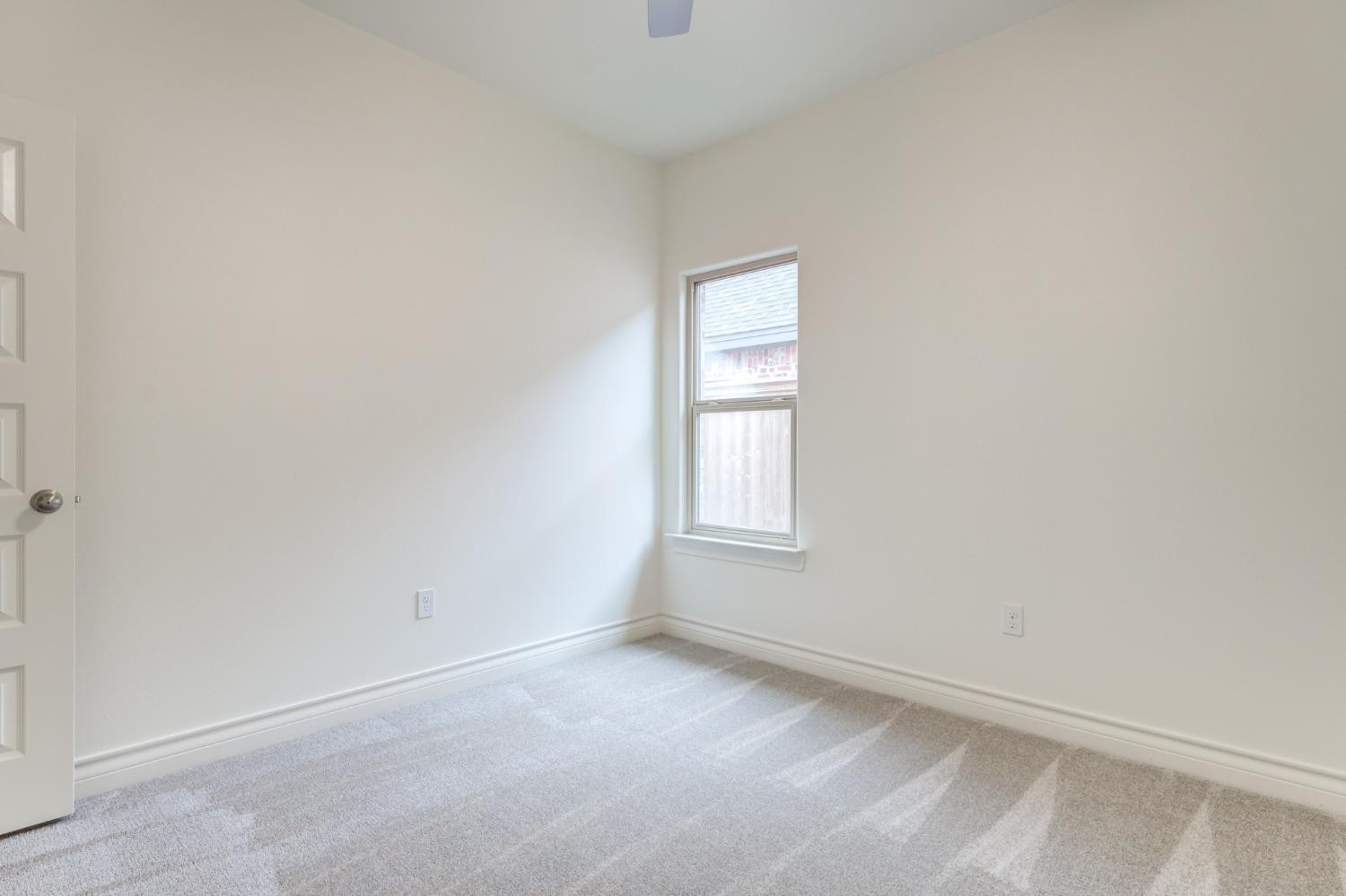 3712 144th Street Lubbock, TX 79423 - Photo 32 of 46 an empty room with a window