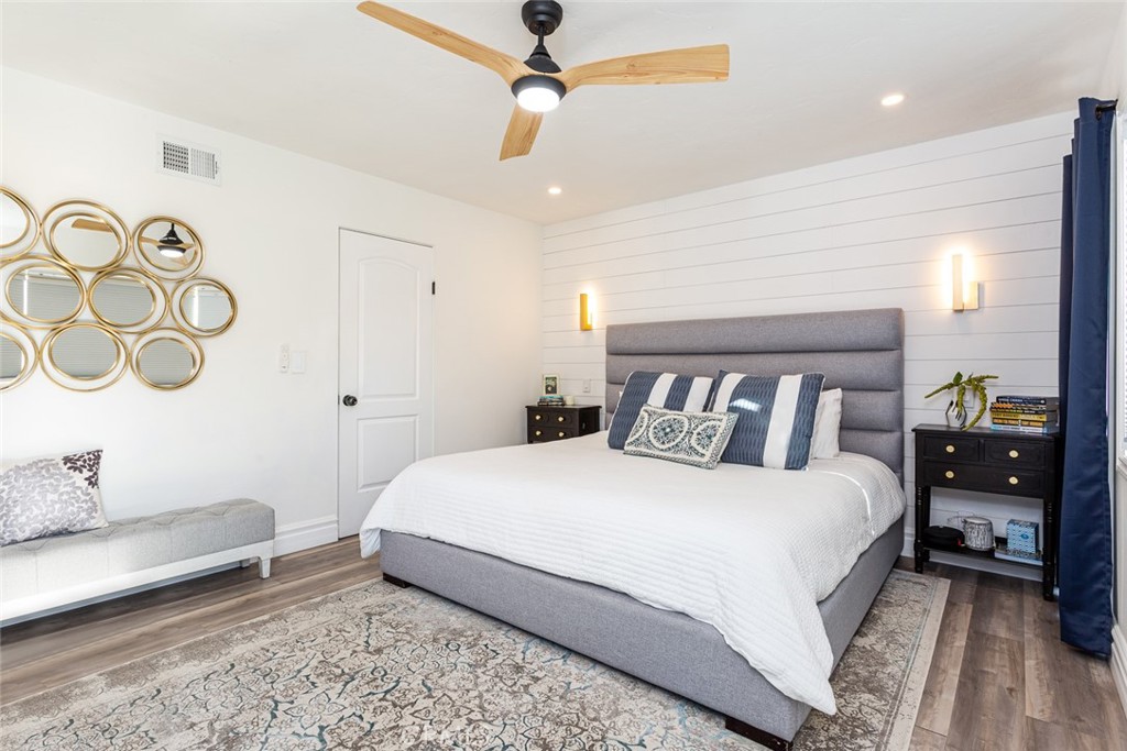 2718 North Wright Street Santa Ana, CA 92705 - Photo 15 of 45 a bedroom with a large bed and a couch