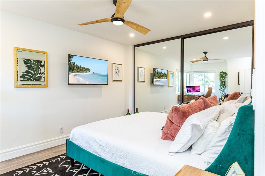 2718 North Wright Street Santa Ana, CA 92705 - Photo 19 of 45 a bedroom with a bed and a painting on the wall