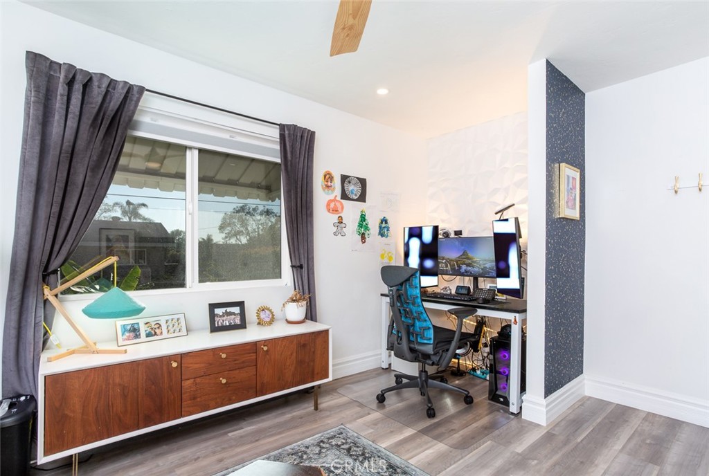 2718 North Wright Street Santa Ana, CA 92705 - Photo 24 of 45 a view of a workspace with furniture and a window