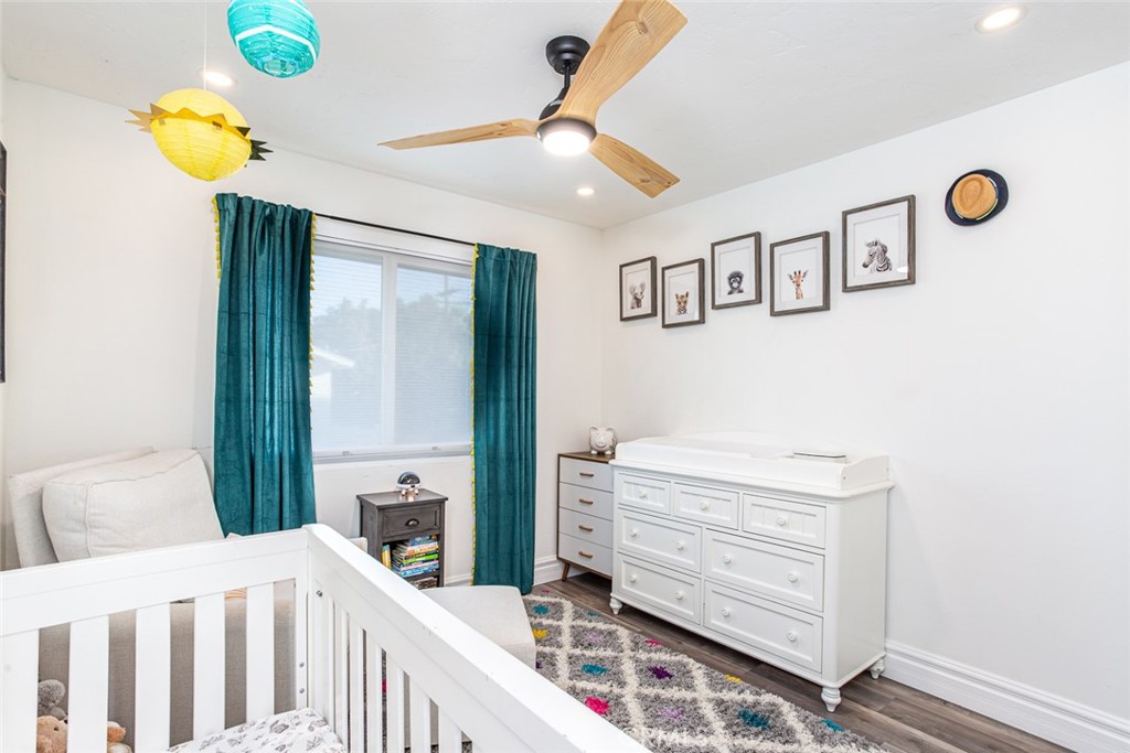 2718 North Wright Street Santa Ana, CA 92705 - Photo 26 of 45 a bedroom with a bed and a window