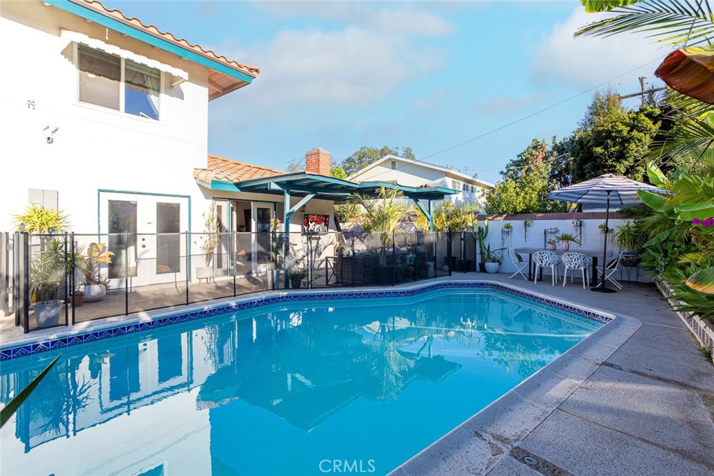 2718 North Wright Street Santa Ana, CA 92705 - Photo 30 of 45 a view of a swimming pool with a patio
