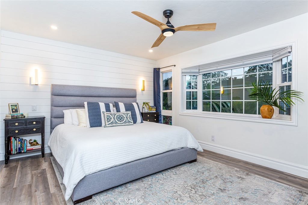 2718 North Wright Street Santa Ana, CA 92705 - Photo 36 of 45 a bedroom with a large bed and a large window