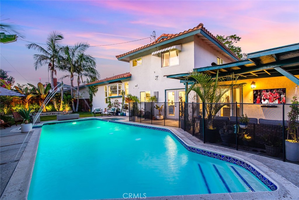 2718 North Wright Street Santa Ana, CA 92705 - Photo 40 of 45 a view of a house with swimming pool