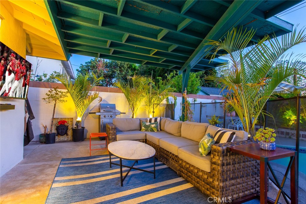 2718 North Wright Street Santa Ana, CA 92705 - Photo 42 of 45 a outdoor living space with furniture and a fireplace