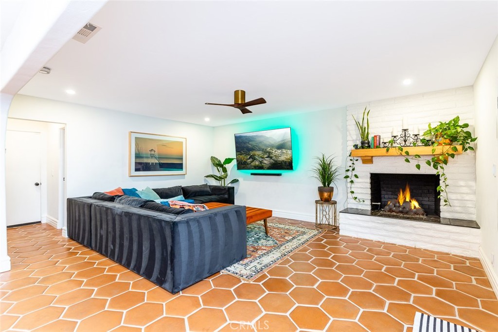 2718 North Wright Street Santa Ana, CA 92705 - Photo 9 of 45 a living room with furniture and a fireplace