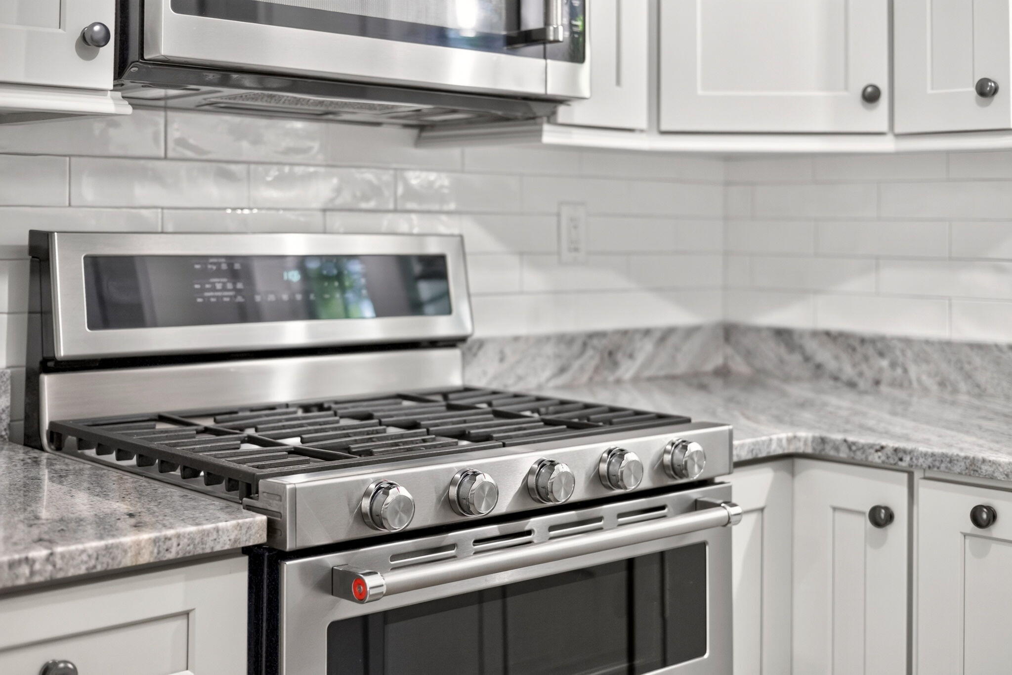 35 Debs Hill Road, Unit 35 Yarmouth Port, MA 02675 - Photo 8 of 36 a stove top oven sitting inside of a kitchen