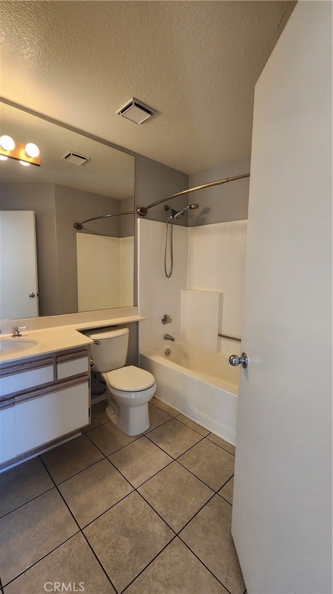 28456 Yosemite Drive Lake Forest, CA 92679 - Photo 11 of 33 a bathroom with a granite countertop bathtub shower sink mirror and toilet