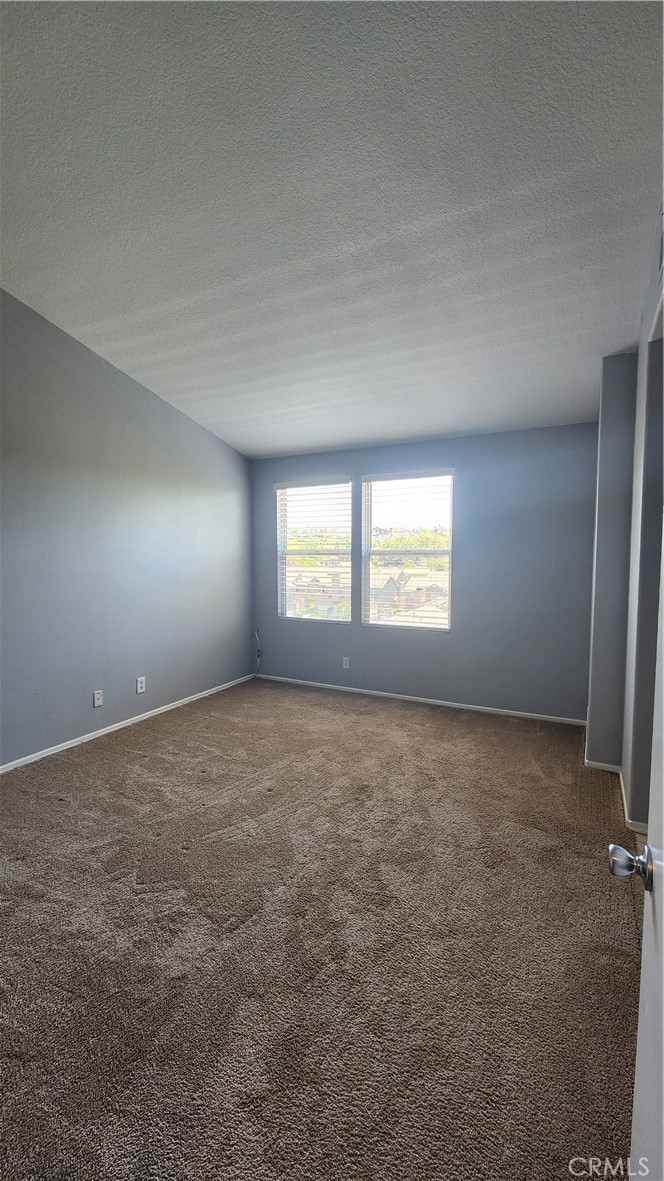 28456 Yosemite Drive Lake Forest, CA 92679 - Photo 17 of 33 an empty room with a window