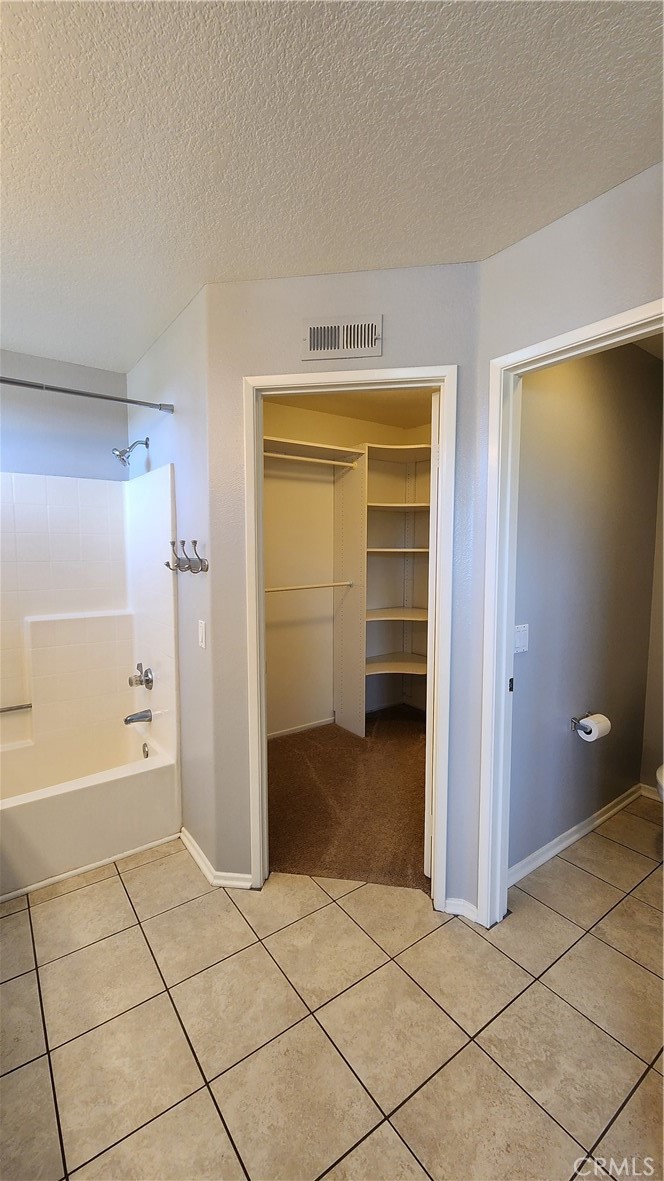28456 Yosemite Drive Lake Forest, CA 92679 - Photo 21 of 33 a bathroom with a bathtub and a sink