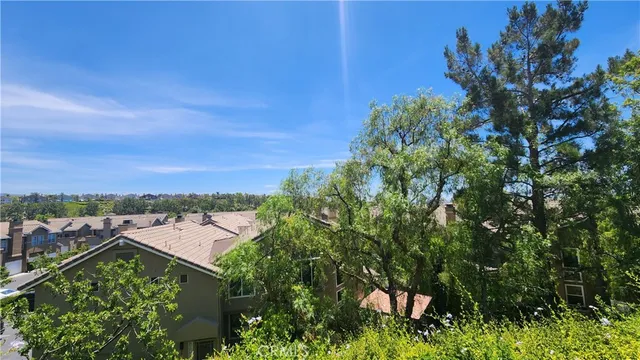 a view of a swimming pool with a table and chairs