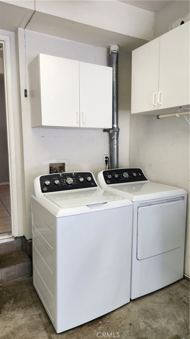 28456 Yosemite Drive Lake Forest, CA 92679 - Photo 33 of 33 a kitchen with white cabinets and white appliances