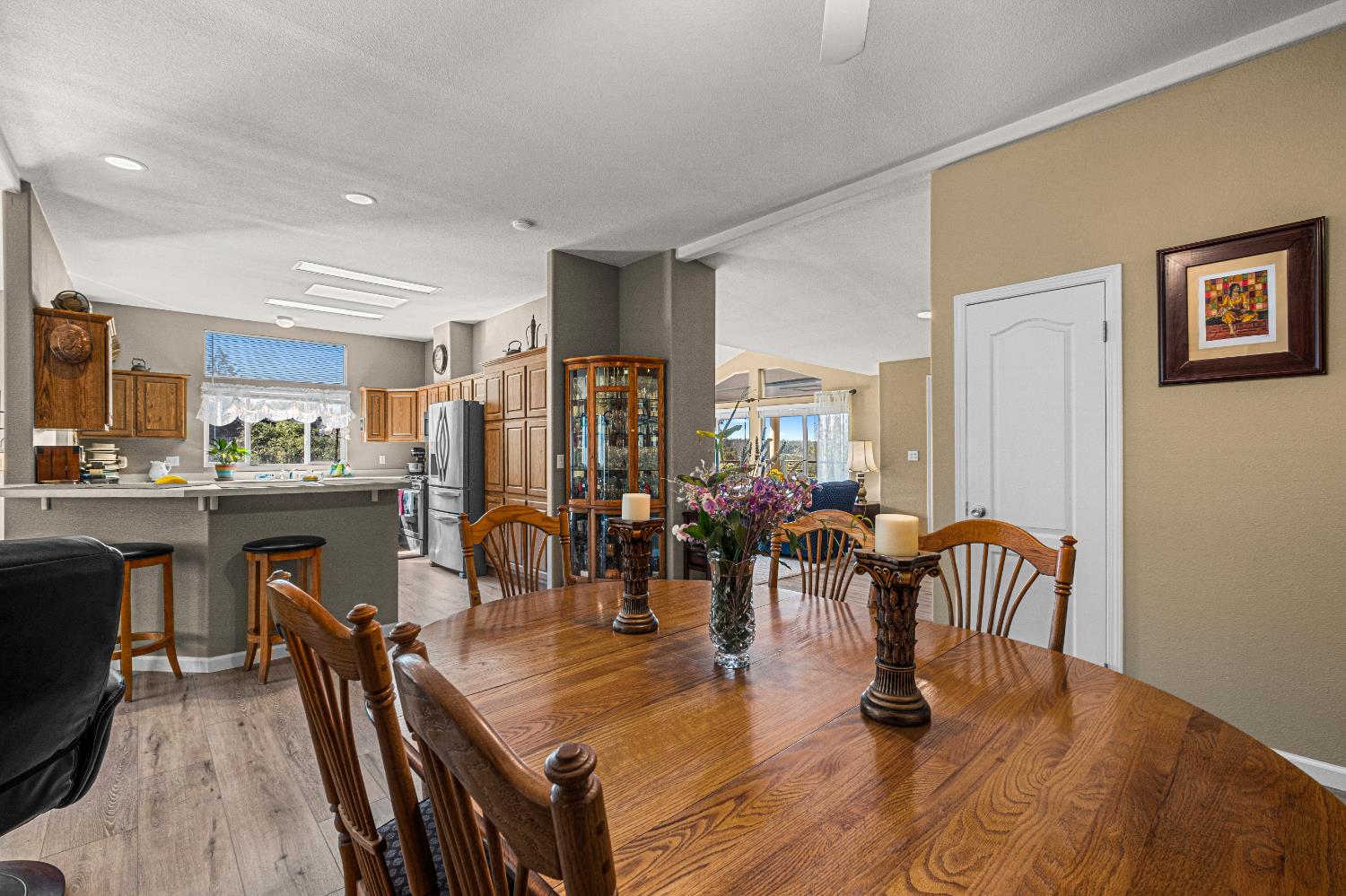 9425 Mosquito Road Placerville, CA 95667 - Photo 25 of 74 a dining room with stainless steel appliances furniture a dining table and chairs