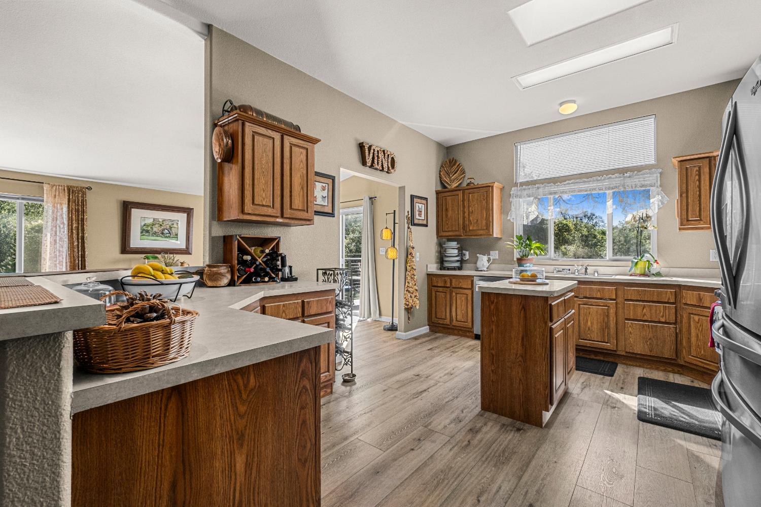 9425 Mosquito Road Placerville, CA 95667 - Photo 27 of 74 a kitchen with a refrigerator a sink dishwasher stove and oven