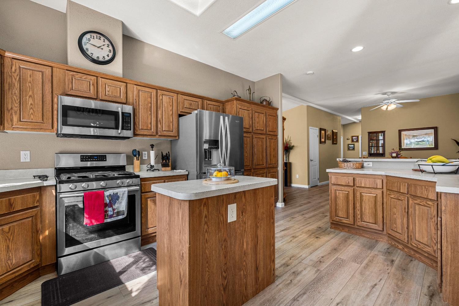 9425 Mosquito Road Placerville, CA 95667 - Photo 30 of 74 a kitchen with stainless steel appliances granite countertop a stove top oven a refrigerator a stove top oven and a sink