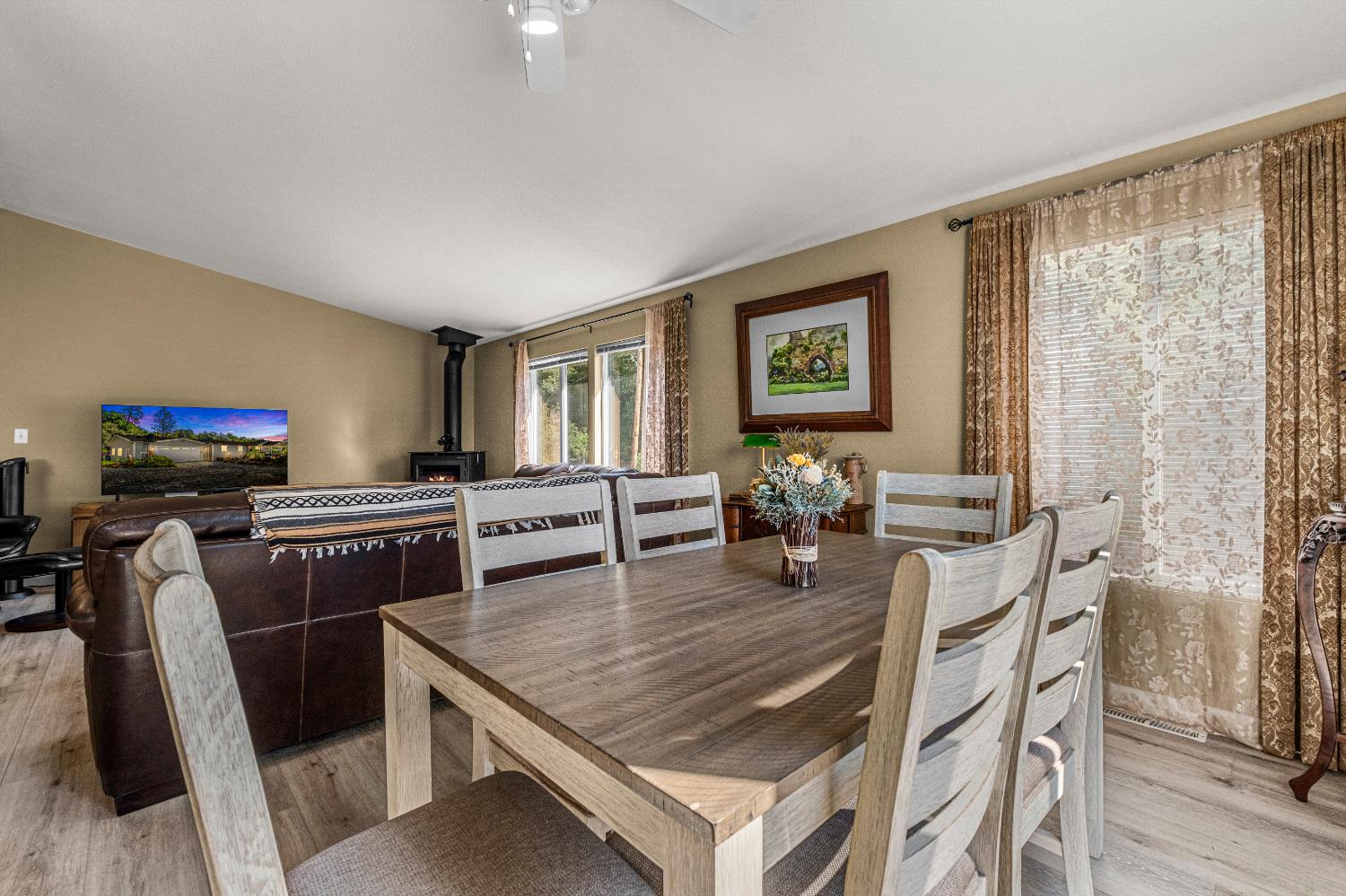 9425 Mosquito Road Placerville, CA 95667 - Photo 35 of 74 a living room with furniture and a flat screen tv