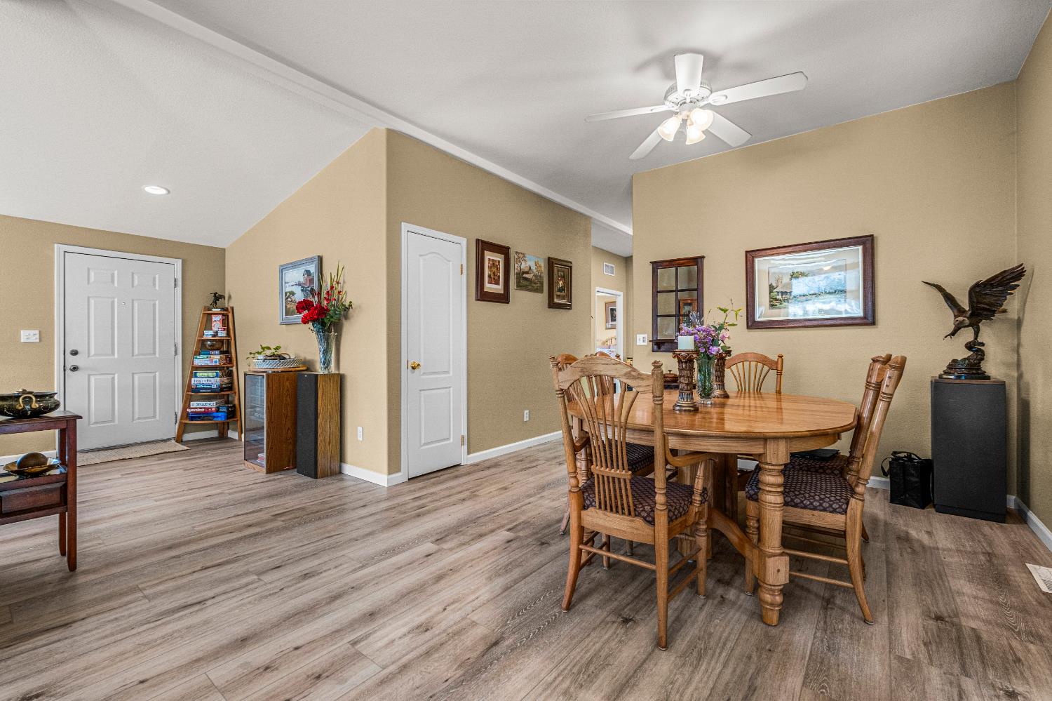 9425 Mosquito Road Placerville, CA 95667 - Photo 36 of 74 a view of a dining room with furniture and wooden floor