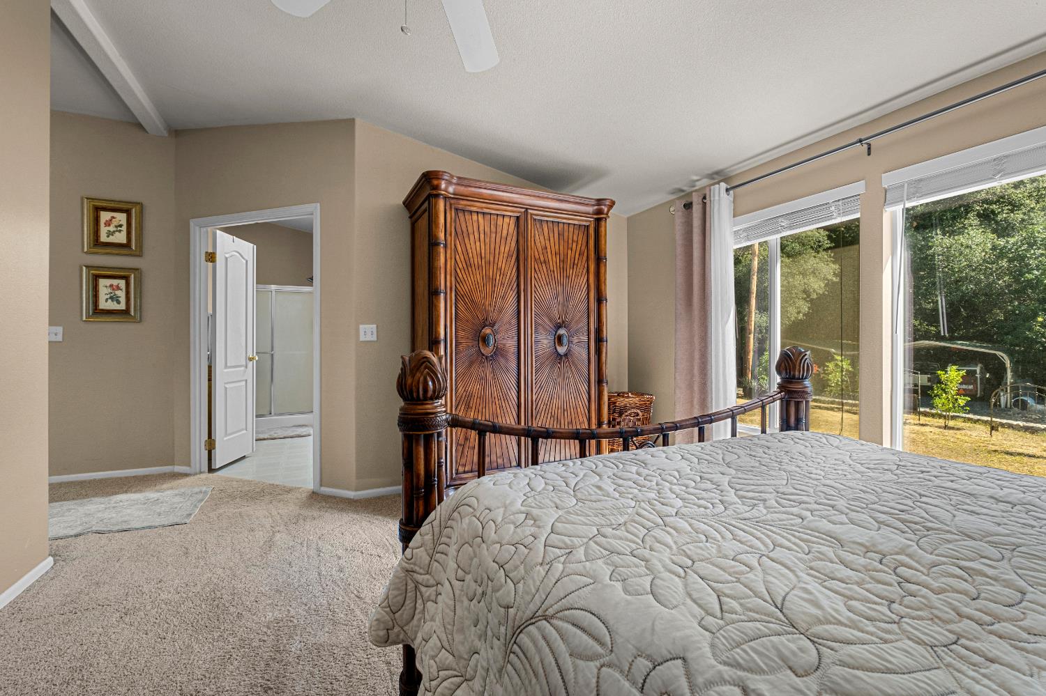 9425 Mosquito Road Placerville, CA 95667 - Photo 39 of 74 a bedroom with a bed and a large window