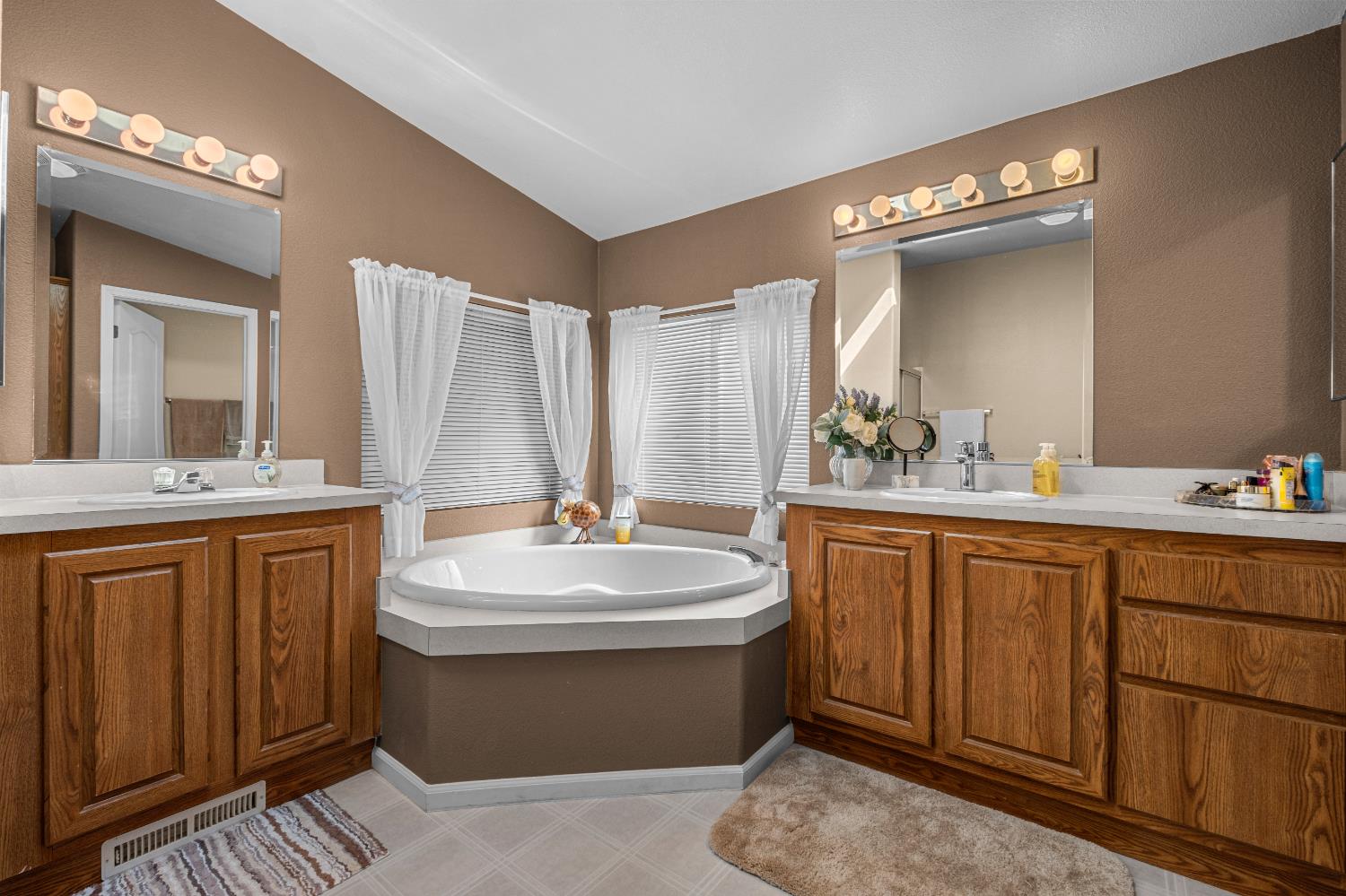 9425 Mosquito Road Placerville, CA 95667 - Photo 40 of 74 a bathroom with a sink a toilet and mirror