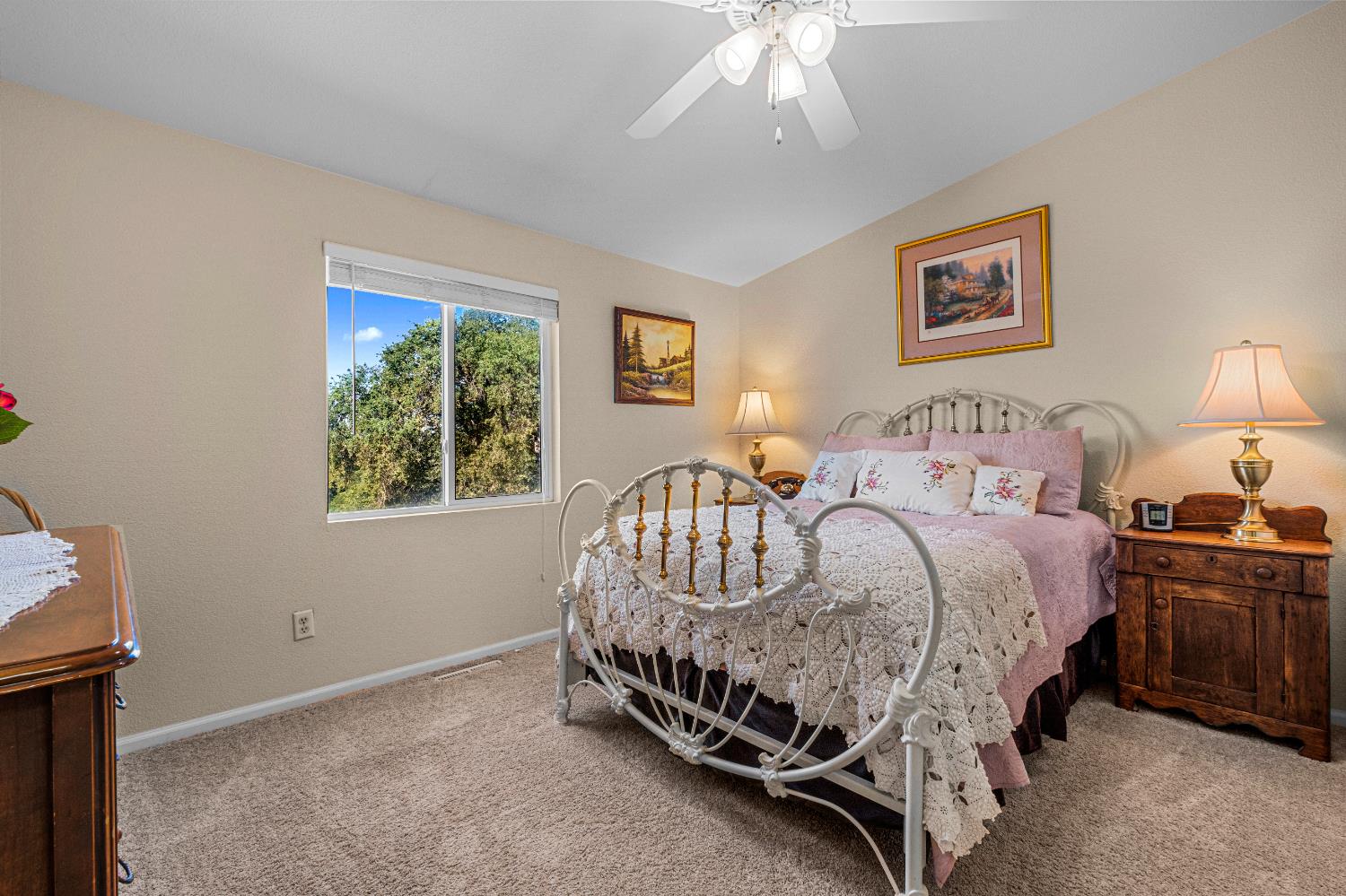 9425 Mosquito Road Placerville, CA 95667 - Photo 44 of 74 a bed sitting in a bedroom next to a window