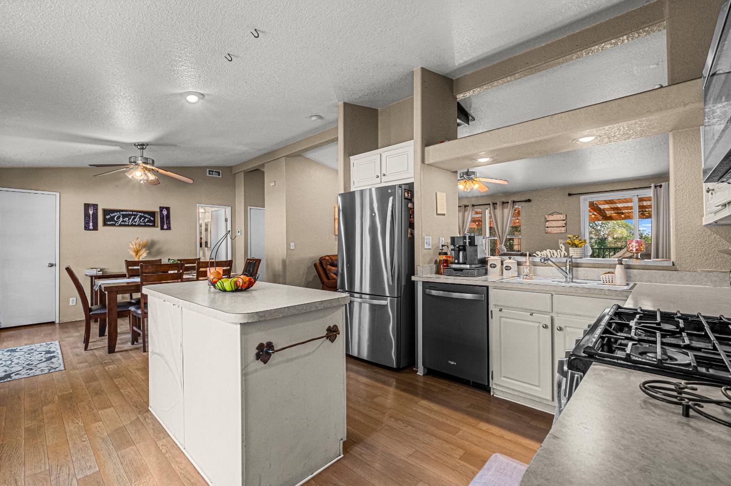 9425 Mosquito Road Placerville, CA 95667 - Photo 55 of 74 a kitchen that has a lot of cabinets in it and stainless steel appliances