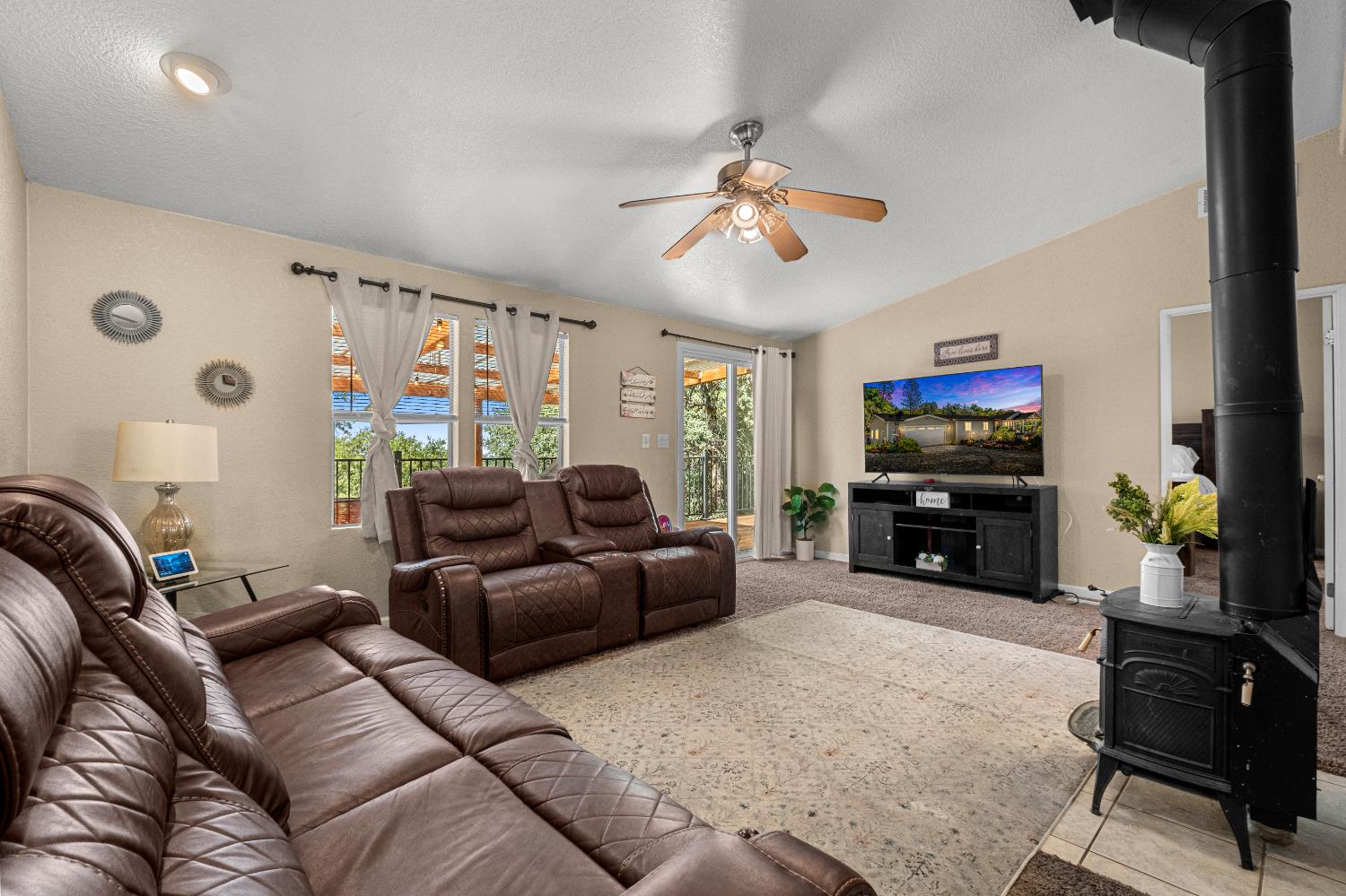 9425 Mosquito Road Placerville, CA 95667 - Photo 58 of 74 a living room with furniture and a flat screen tv