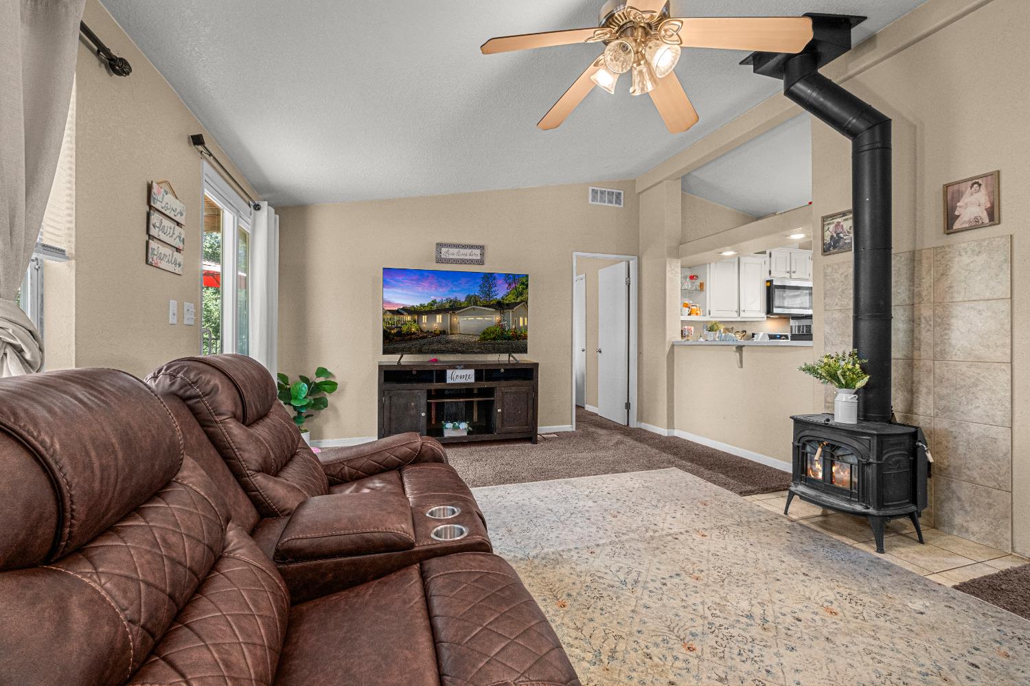 9425 Mosquito Road Placerville, CA 95667 - Photo 59 of 74 a living room with furniture and a flat screen tv