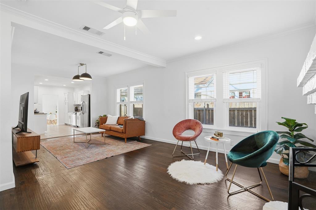 1102 Brunner Avenue Dallas, TX 75224 - Photo 11 of 38 a view of a dining room with furniture and wooden floor