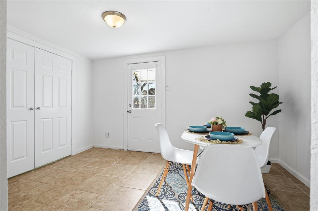 1102 Brunner Avenue Dallas, TX 75224 - Photo 22 of 38 a dining room with furniture and window