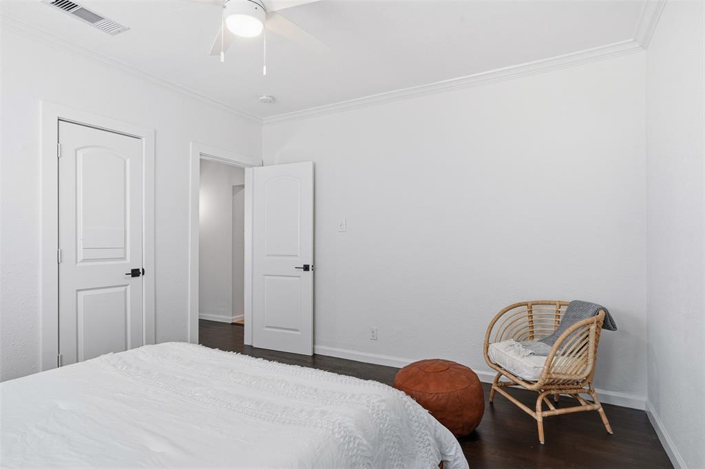 1102 Brunner Avenue Dallas, TX 75224 - Photo 25 of 38 a bedroom with a bed chair and piano