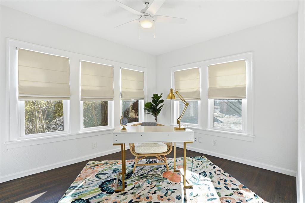 1102 Brunner Avenue Dallas, TX 75224 - Photo 26 of 38 a dining room with wooden floor and a window