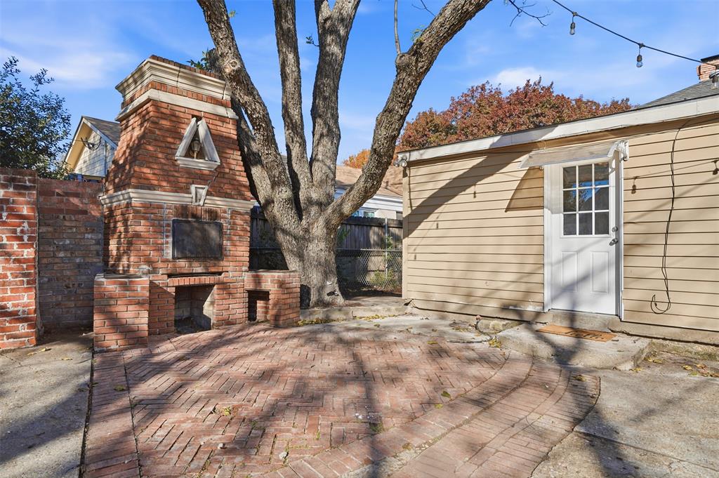 1102 Brunner Avenue Dallas, TX 75224 - Photo 29 of 38 a view of a building with a bench