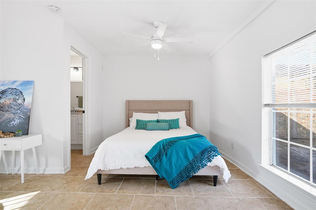 1102 Brunner Avenue Dallas, TX 75224 - Photo 33 of 38 a bedroom with a bed and a window