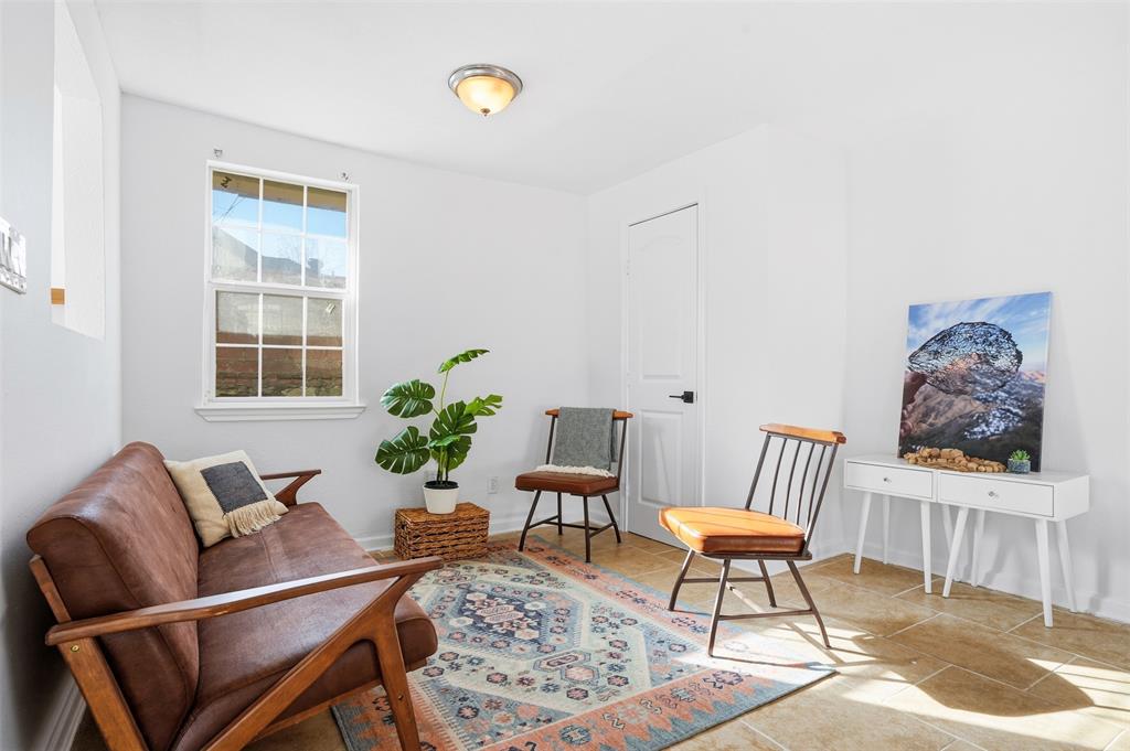 1102 Brunner Avenue Dallas, TX 75224 - Photo 35 of 38 a living room with furniture and wooden floor