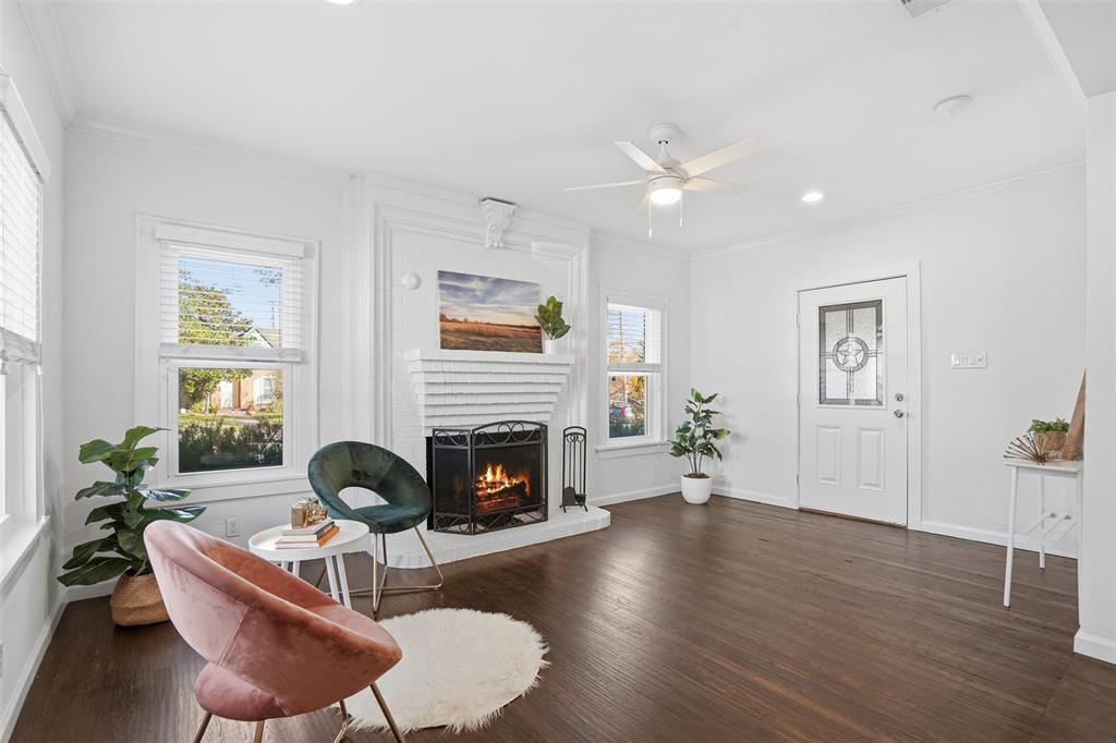 1102 Brunner Avenue Dallas, TX 75224 - Photo 9 of 38 a living room with furniture and a fireplace