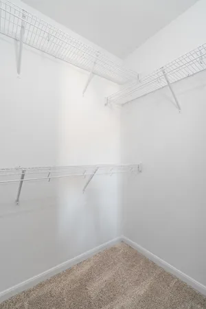 a view of a room with racks on the wall