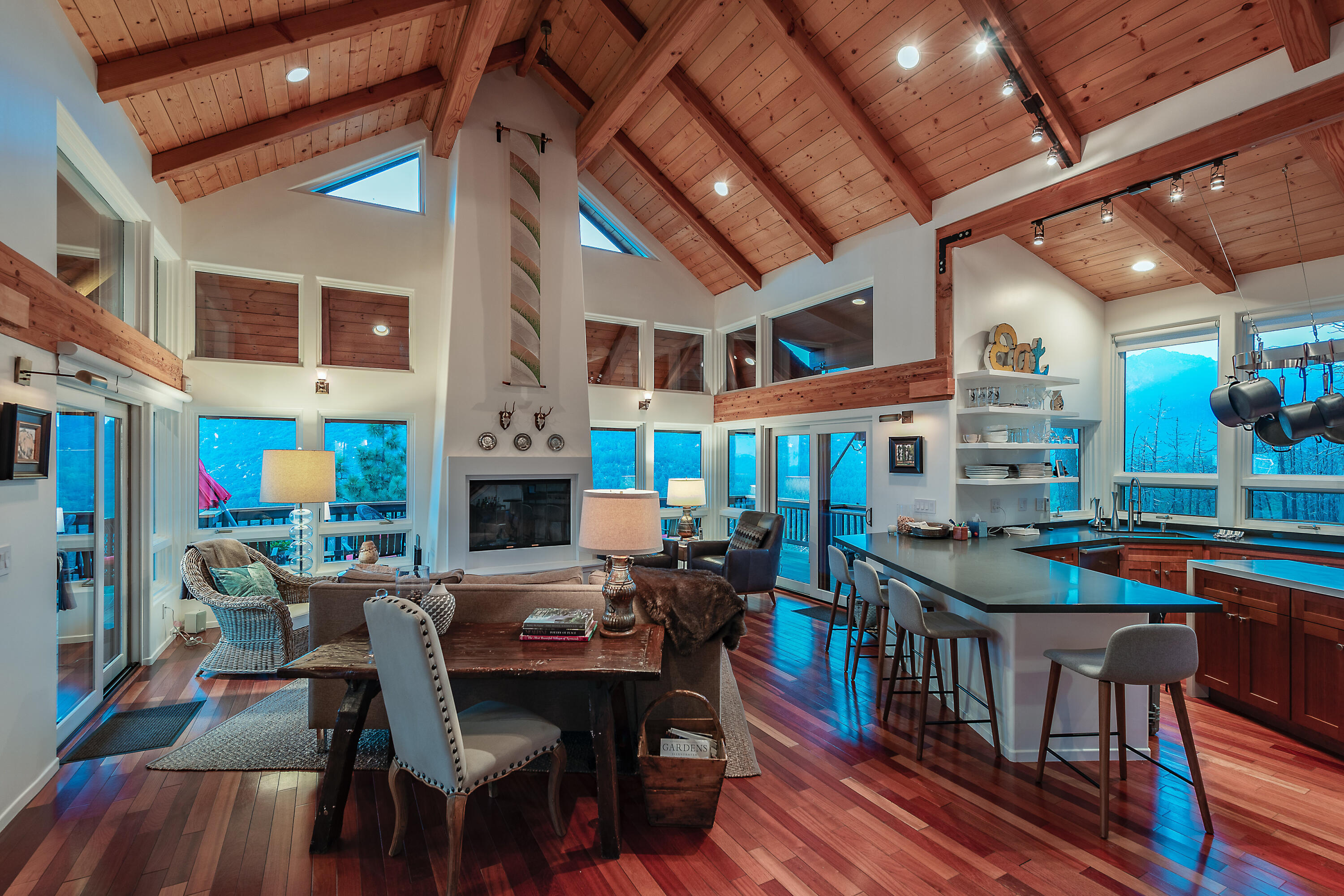 52430 Double View Drive Idyllwild, CA 92549 - Photo 12 of 74 a view of a dining room with furniture window and wooden floor