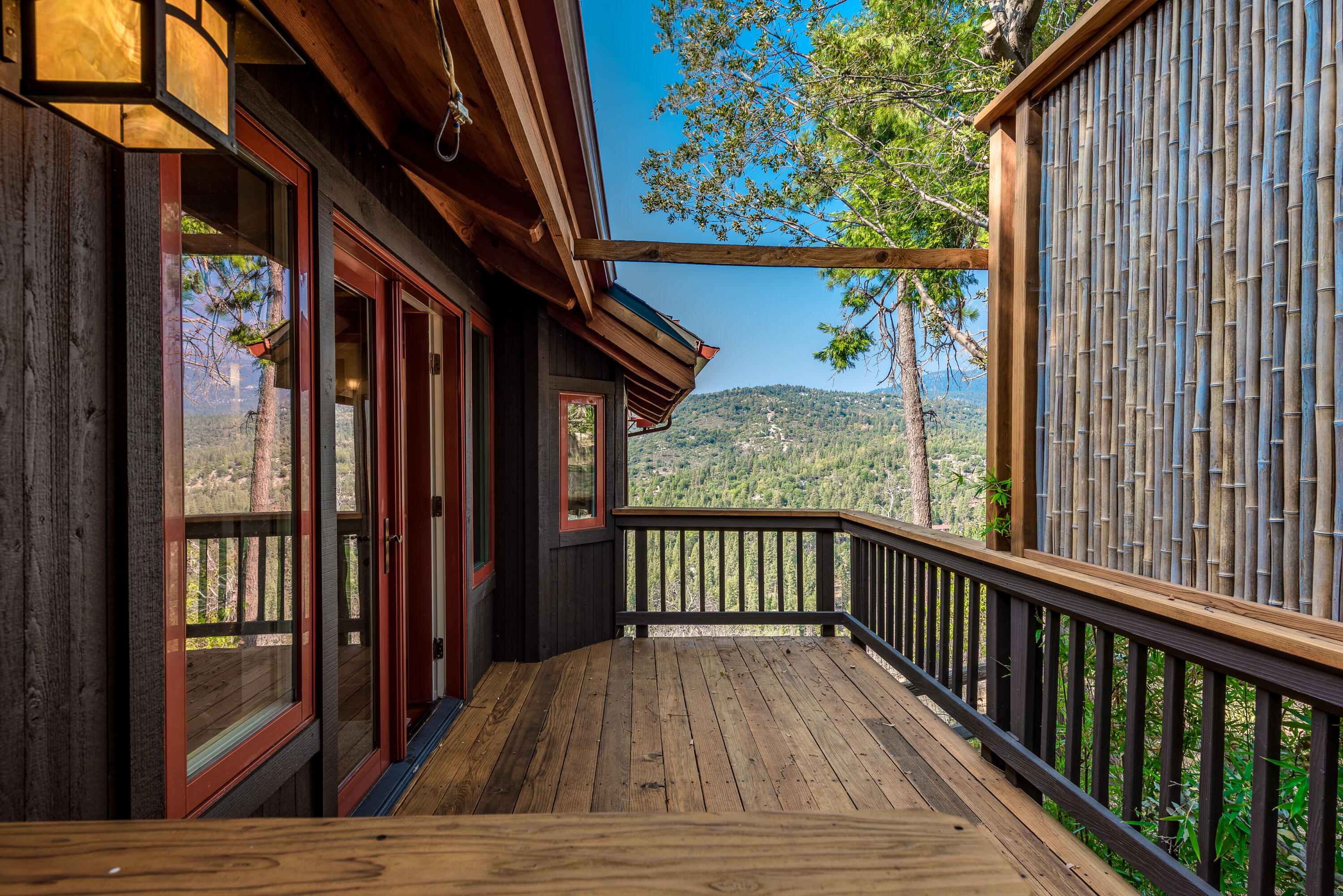 52430 Double View Drive Idyllwild, CA 92549 - Photo 27 of 74 a view of balcony with wooden floor and outdoor seating