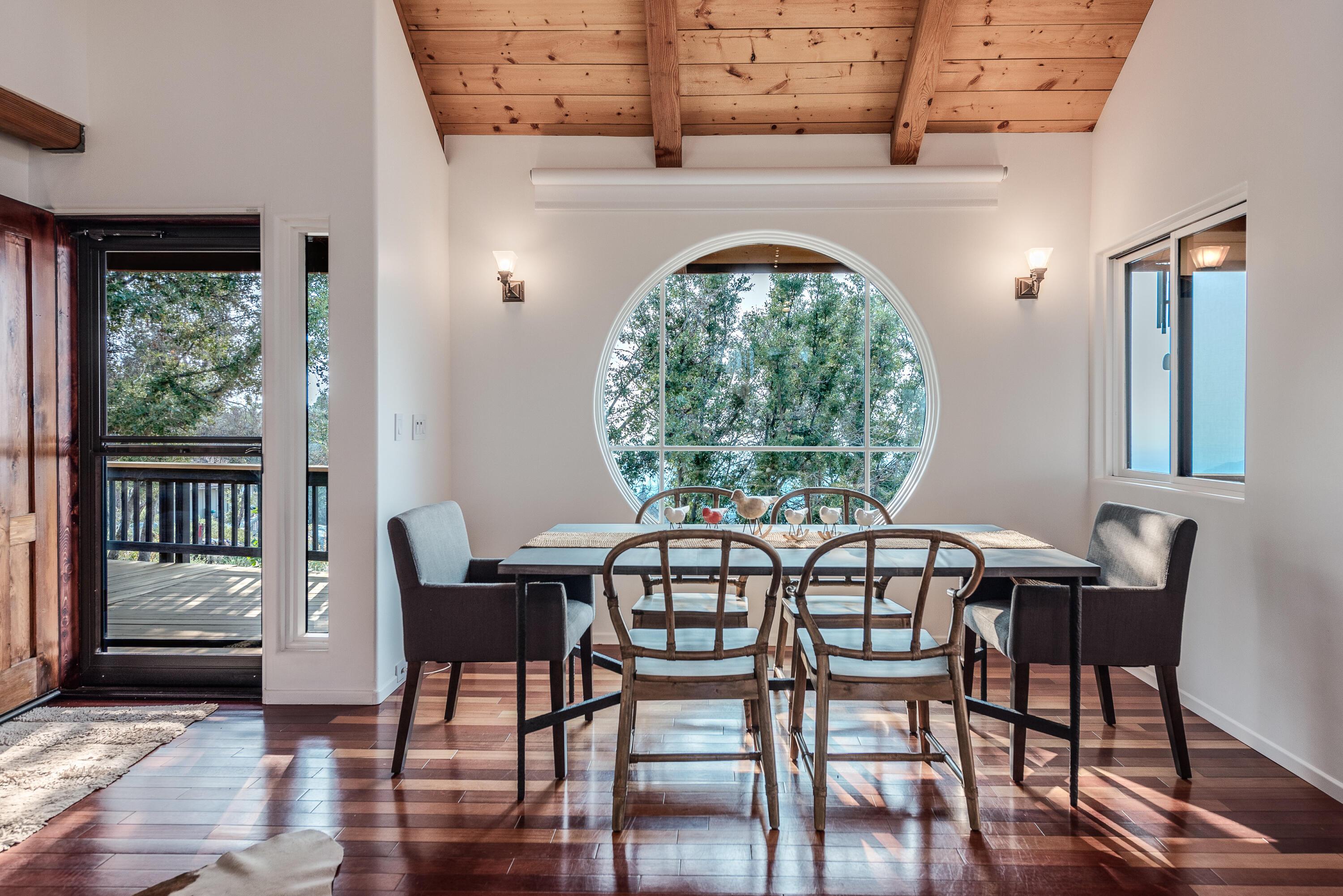 52430 Double View Drive Idyllwild, CA 92549 - Photo 37 of 74 a view of a dining room with furniture window and wooden floor