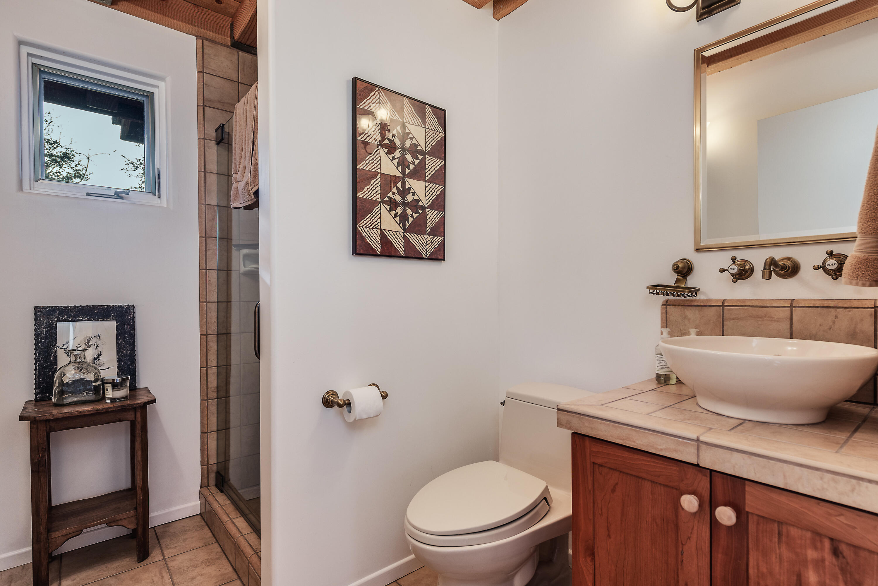 52430 Double View Drive Idyllwild, CA 92549 - Photo 62 of 74 a bathroom with a toilet a sink and mirror