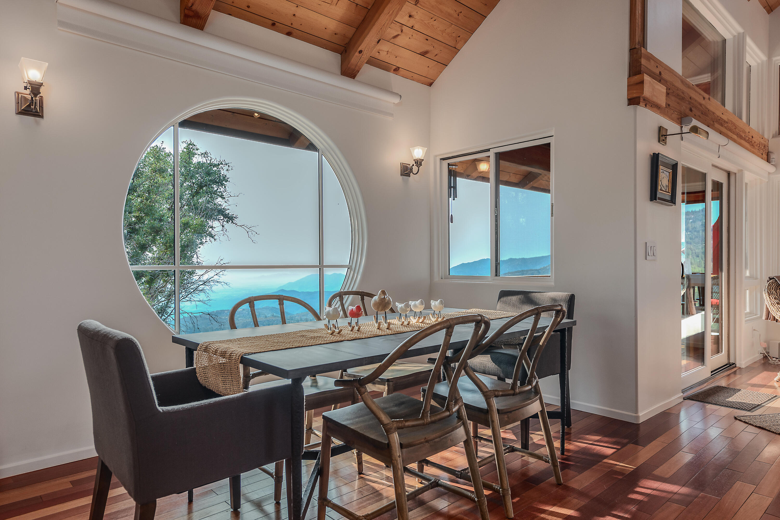 52430 Double View Drive Idyllwild, CA 92549 - Photo 10 of 74 a view of a dining room with furniture window and outside view