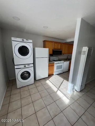 a view of kitchen and washer and dryer