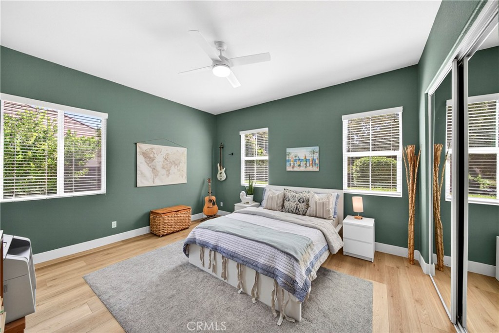 16375 Ory Circle Riverside, CA 92503 - Photo 33 of 51 a bedroom with a bed and wooden floor