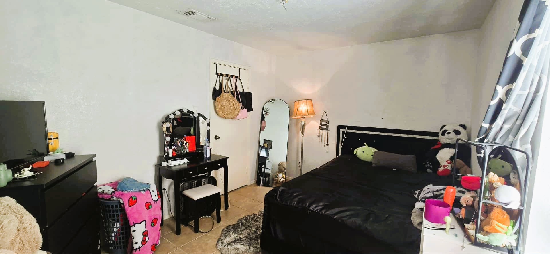 2303 Spring Dusk Drive Spring, TX 77373 - Photo 7 of 13 a bedroom with a bed and a closet