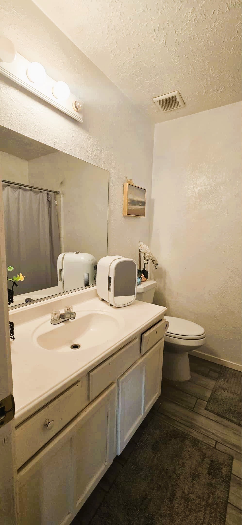 2303 Spring Dusk Drive Spring, TX 77373 - Photo 8 of 13 a room with a sink and a toilet