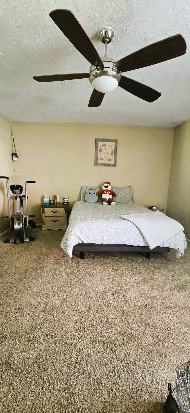 2303 Spring Dusk Drive Spring, TX 77373 - Photo 10 of 13 a bedroom with bed and window