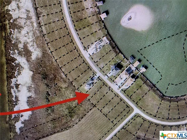 an aerial view of a house with a swimming pool